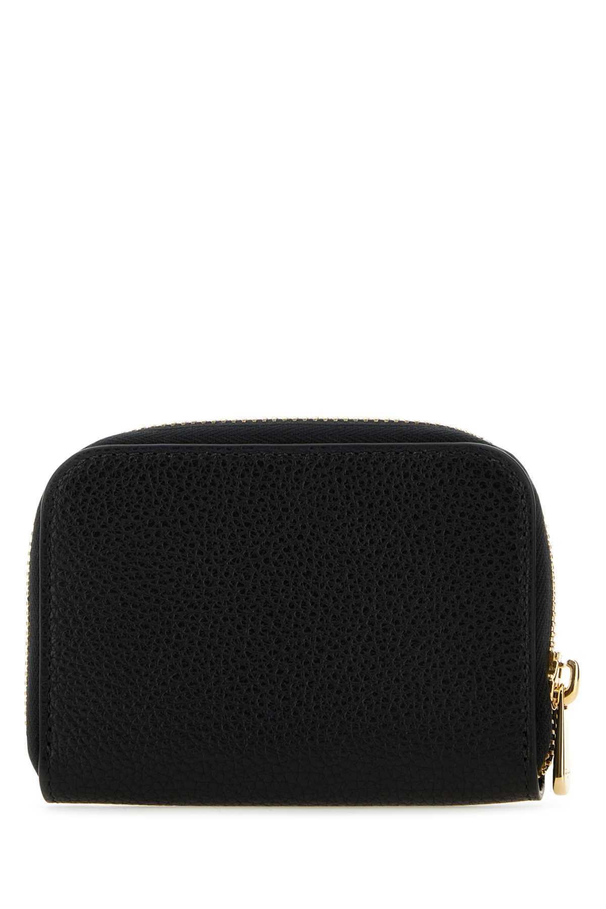 Porta-moedas feminino Salvatore Ferragamo em couro preto
