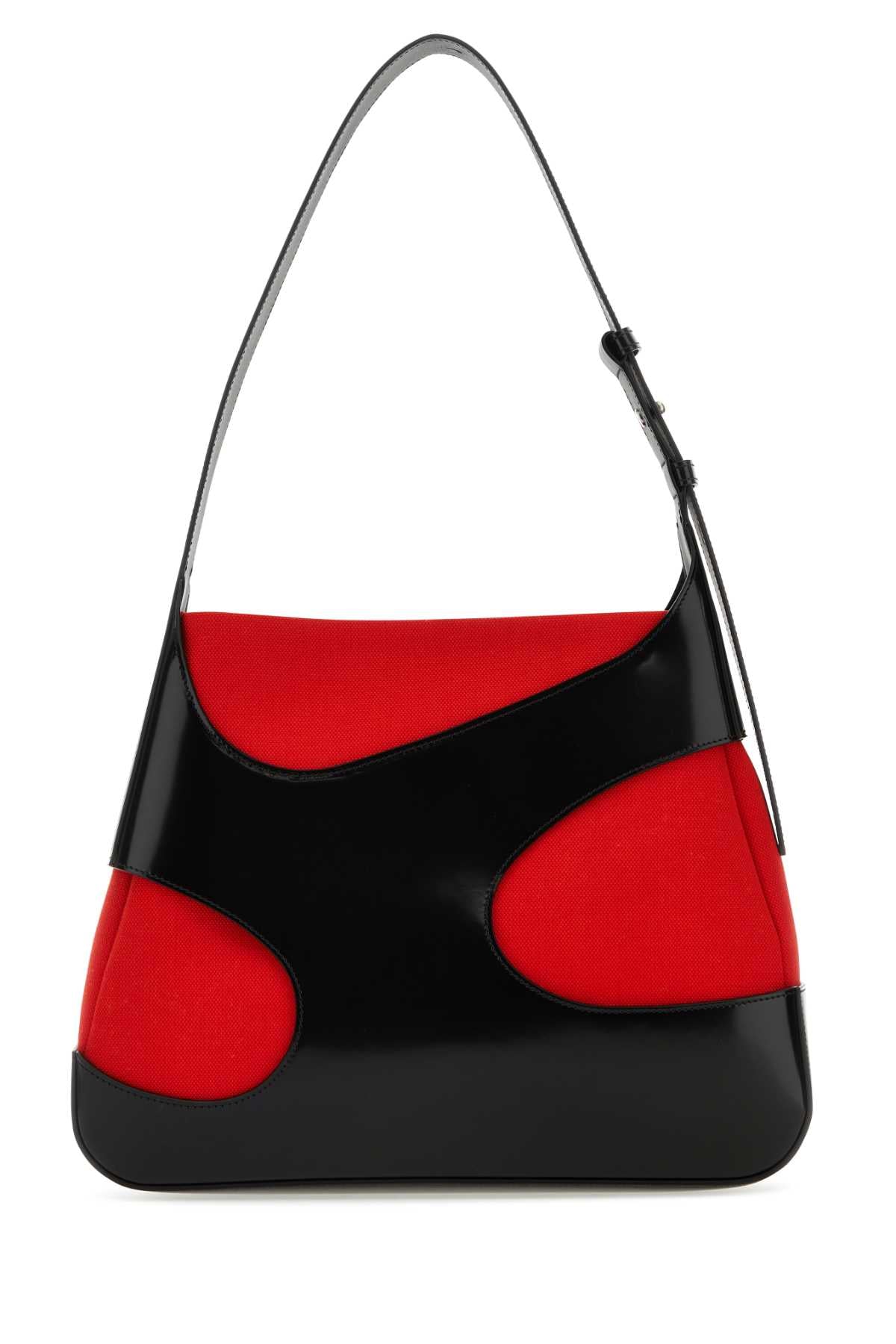 Bolsa de ombro feminina Salvatore Ferragamo tamanho G, bicolor, em couro e lona com recortes.