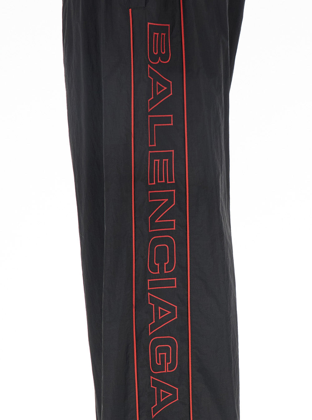 Balenciaga Men Black Pants With Elastic Drawstring And Side Band With Logo Lettering In Tech Fabric Man