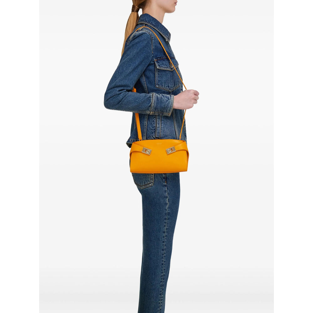 Bolsa clutch laranja Ferragamo feminina